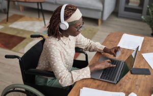 A customer entering their credit card details on a laptop